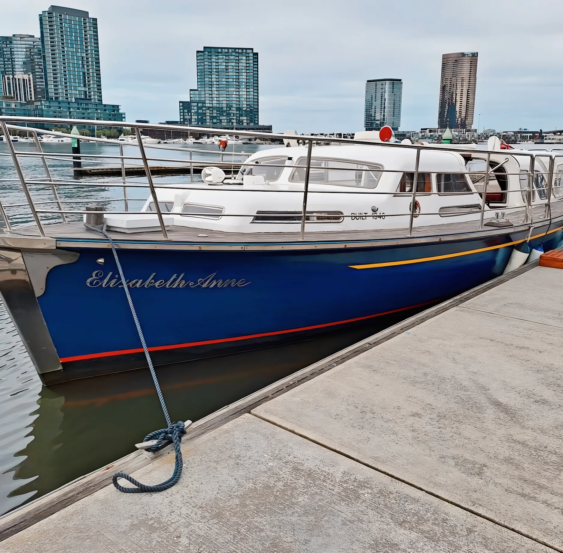 Elizabeth Anne's bow at berth, her name in script on the navy hull beside the BUILT 1946 mark